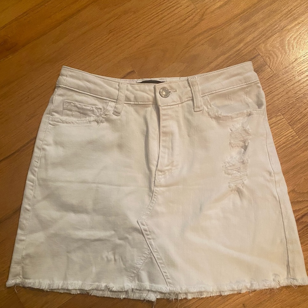 White distressed denim skirt